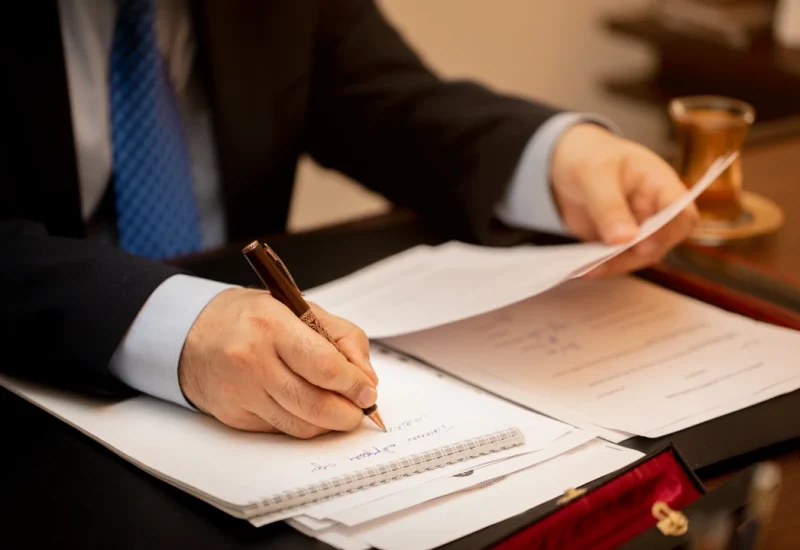 businessman-signing-important-contract-papers.webp